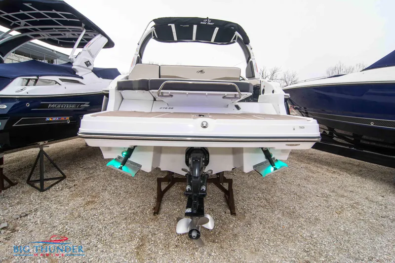 Slide: The Image of 2024 Monterey 278 SS boat rear view with outboard motor and swim platform. - 4