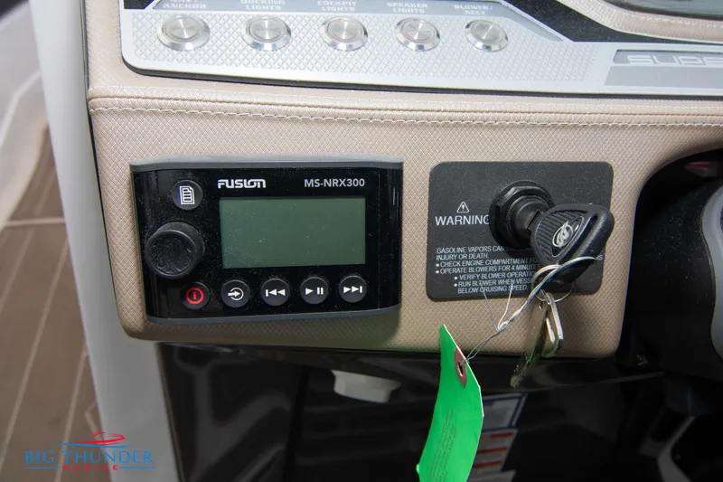 Slide: The Image of 2024 Monterey 278 SS dashboard with Fusion MS-NRX300 stereo and ignition keys. - 45