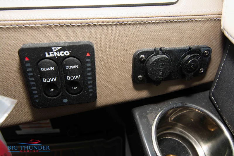 Slide: The Image of Control panel of a 2024 Monterey 278 SS boat with Lenco trim tab switches. - 46