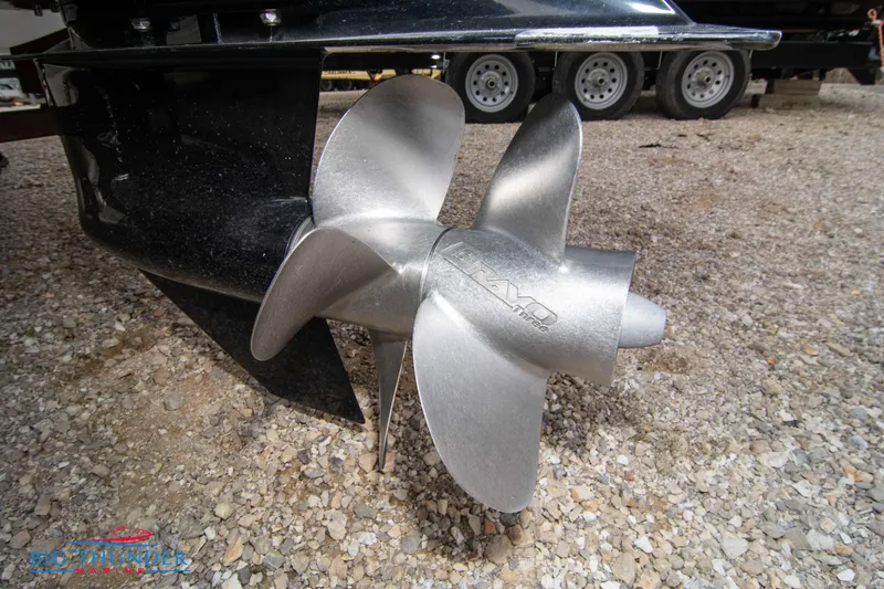 Slide: The Image of Close-up of 2024 Monterey 278 SS boat propeller on gravel. - 7