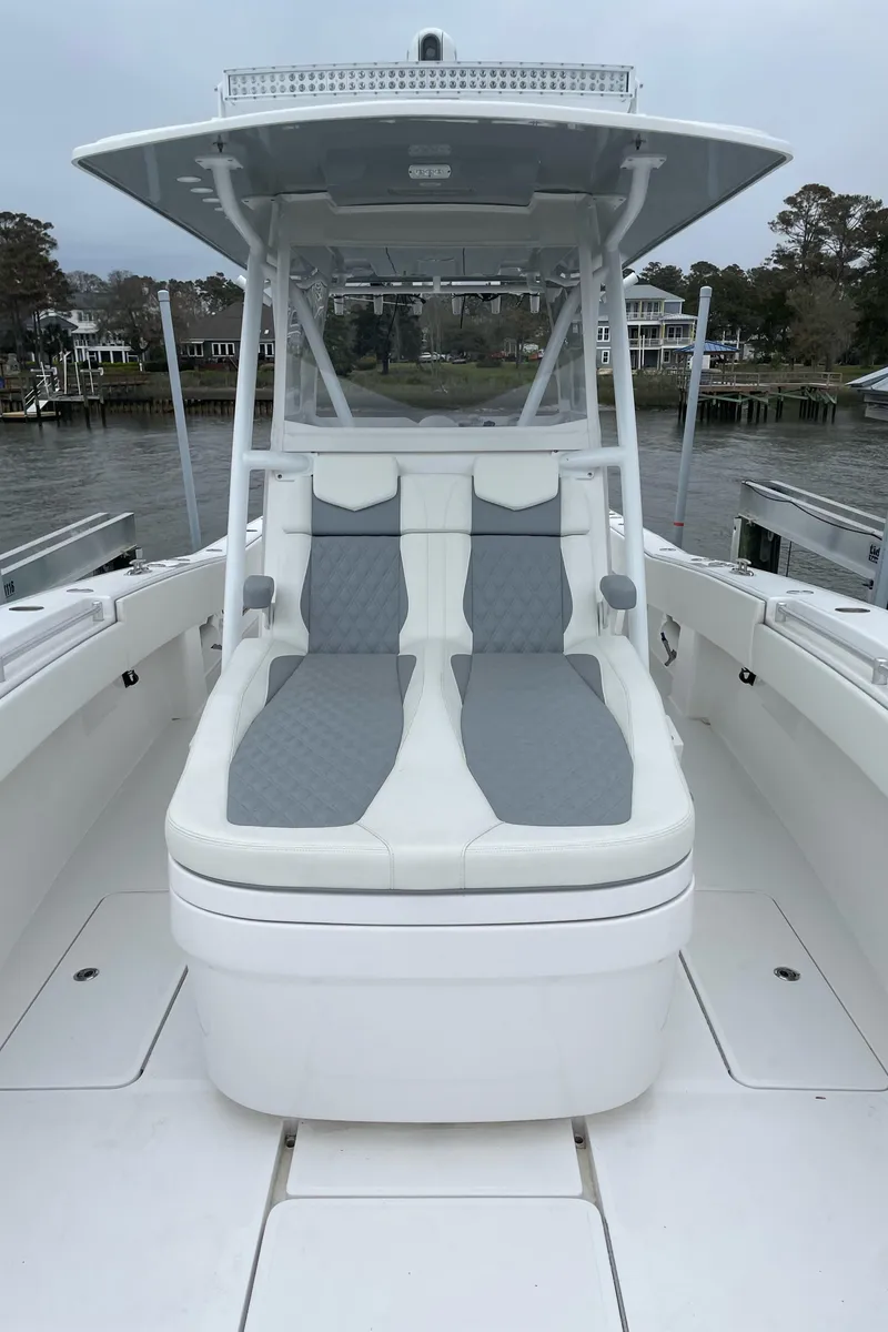Slide: The Image of 2022 Invincible 36 Open Fisherman boat with cushioned seating. - 8