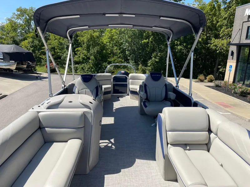 Slide: The Image of 2022 South Bay 224 RS pontoon boat with spacious seating and canopy. - 10