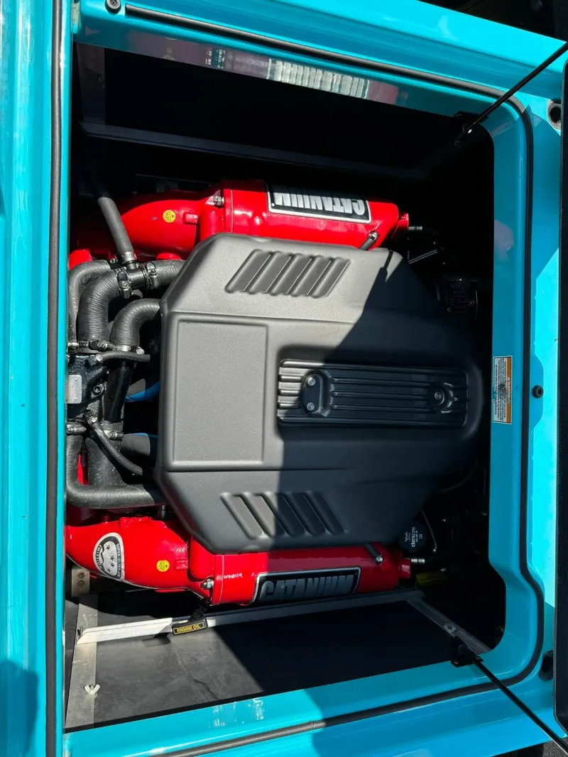 Slide: The Image of Engine compartment of 2017 Nautique Super Air Nautique GS22 boat. - 14