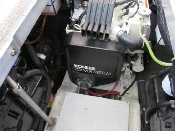Slide: The Image of Engine compartment of 2000 Carver 404 Cockpit Motor Yacht with Kohler power system. - 21