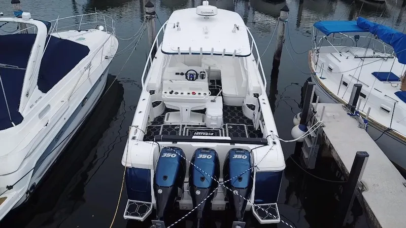 Slide: The Image of 2008 Intrepid 390 Sport Yacht docked with triple 350 engines. - 11