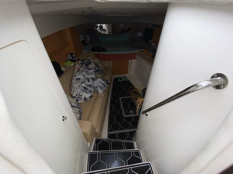 Slide: The Image of Interior cabin of a 2008 Intrepid 390 Sport Yacht with seating and bedding. - 19