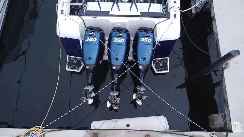 Slide: The Image of 2008 Intrepid 390 Sport Yacht with triple 350 horsepower engines docked. - 23