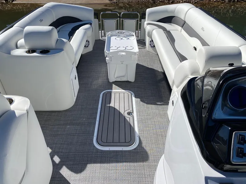 Slide: The Image of 2024 JC Neptoon Sport 23TT pontoon boat interior with luxurious seating and modern amenities. - 4
