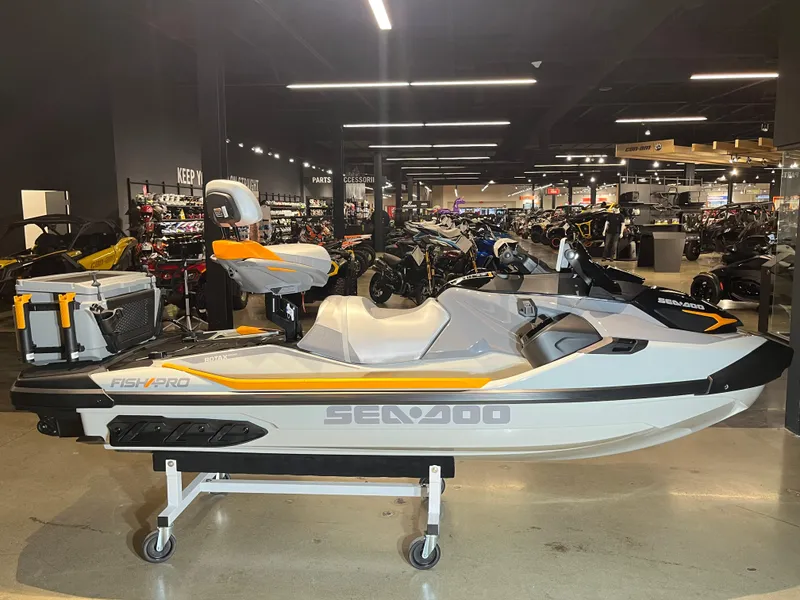 Slide: The Image of 2024 Sea-Doo Fishpro Trophy 170 on display in a showroom. - 1