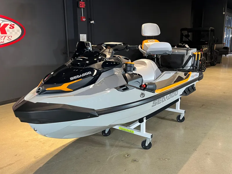 Slide: The Image of 2024 Sea-Doo Fishpro Trophy 170 on display in a showroom. - 5