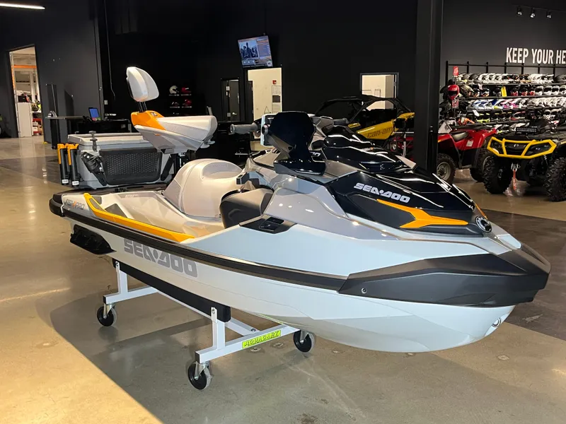 Slide: The Image of 2024 Sea-Doo Fishpro Trophy 170 on display in a showroom. - 7