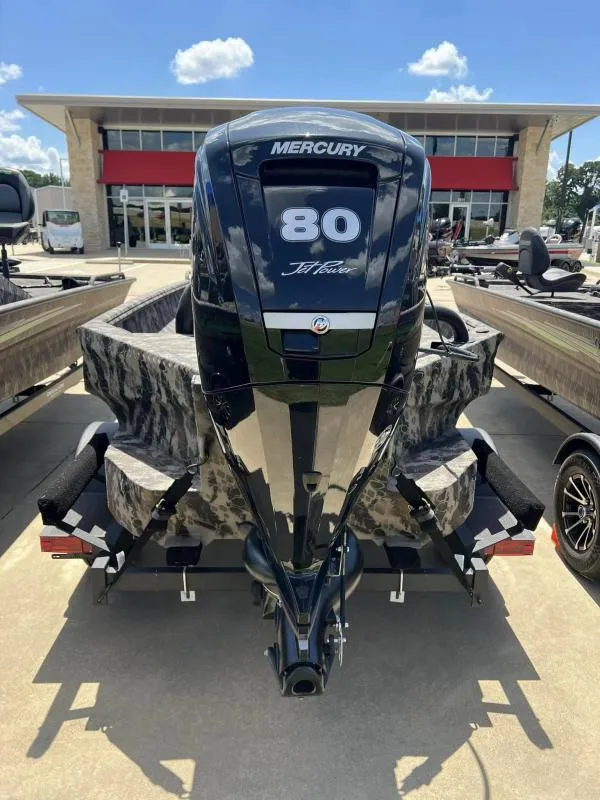 Slide: The Image of 2024 Havoc Boats 1756 FRRSCST with Mercury 80 engine, displayed outdoors. - 6