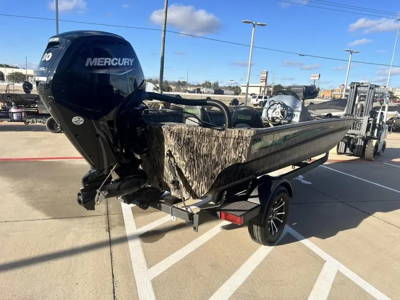 Slide: The Image of 2024 Havoc Boats 1856 FRRSC with Mercury outboard motor on trailer. - 4