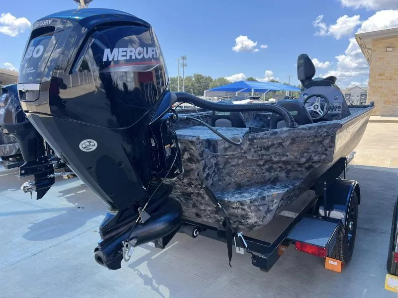 Slide: The Image of 2024 Havoc Boats 1756 FRRSCST with Mercury engine, parked outdoors under clear sky. - 3