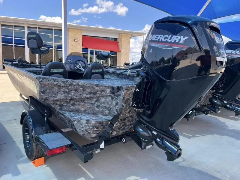 Slide: The Image of 2024 Havoc Boats 1756 FRRSCST with Mercury engine, displayed outdoors. - 4