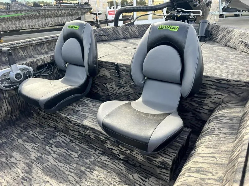 Slide: The Image of 2024 Havoc Boats 1756 FRRSC interior with dual seats and camo design. - 12