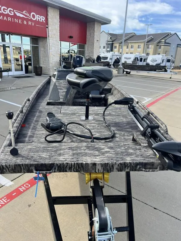 Slide: The Image of 2024 Havoc Boats 1756 FRRSC fishing boat displayed at dealership. - 7