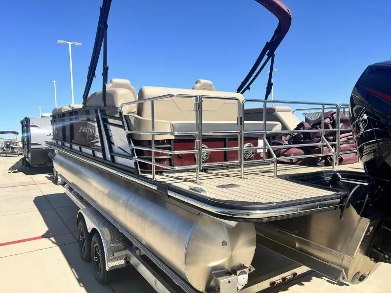 Slide: The Image of 2023 Starcraft SLS-5 Q DH pontoon boat with outboard motor on trailer. - 3