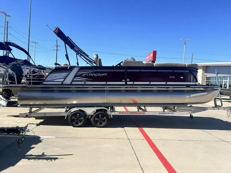 Slide: The Image of 2023 Starcraft SLS-5 Q DH pontoon boat on a trailer at a dealership. - 5