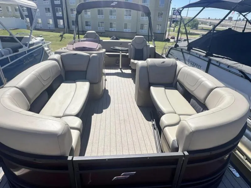 Slide: The Image of 2023 Starcraft SLS-5 Q DH pontoon boat with spacious seating and modern design. - 7