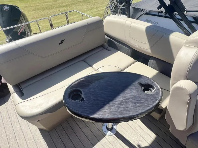 Slide: The Image of 2023 Starcraft SLS-5 Q DH boat interior with seating and table. - 9