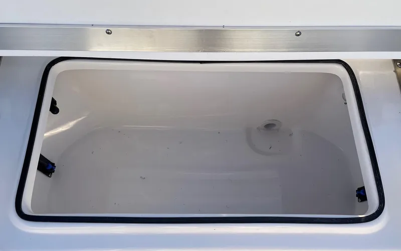 Slide: The Image of 2024 Sea Fox 251 Bay Fox storage compartment. - 21