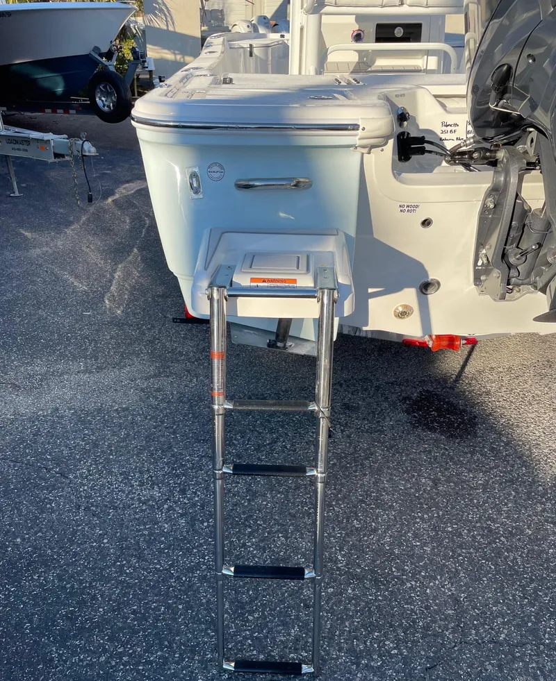 Slide: The Image of 2024 Sea Fox 251 Bay Fox boat with extended ladder. - 26