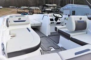 Slide: The Image of 2023 Hurricane SUNDECK SPORT 205 I/O boat interior with white and gray seating. - 12