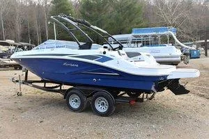 Slide: The Image of 2023 Hurricane SUNDECK SPORT 205 I/O boat on trailer, side view. - 3
