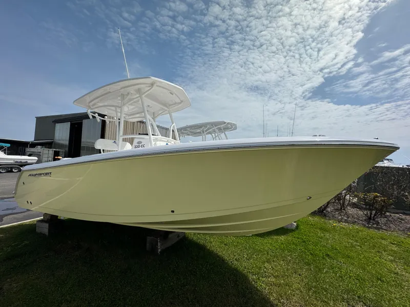 The Image of 2024 Aquasport 2200 CC center console boat on display. - 0