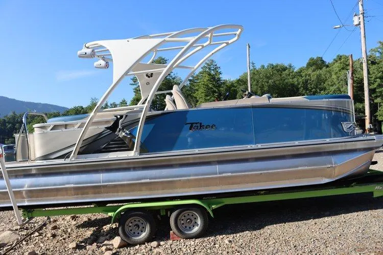 Slide: The Image of 2022 Tahoe Pontoon LTZ 2485 QL on trailer, side view. - 16