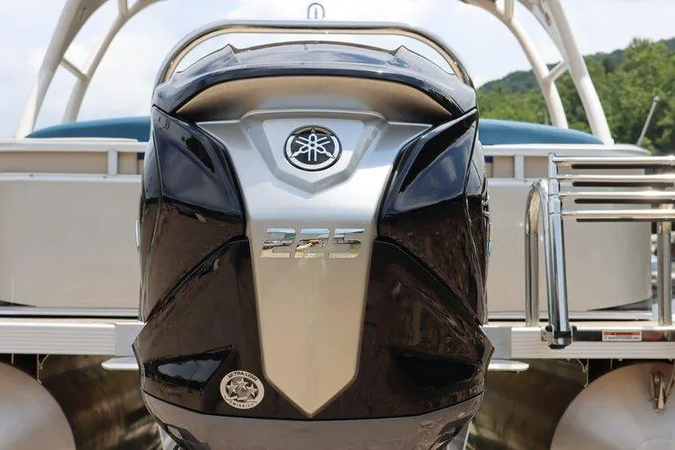Slide: The Image of 2022 Tahoe Pontoon LTZ 2485 QL with Yamaha 225 outboard motor. - 23