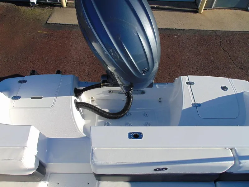 Slide: The Image of 2024 Hurricane SunDeck 191 OB boat stern with outboard motor. - 11
