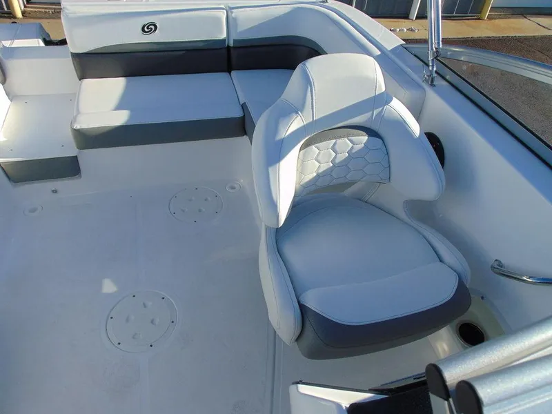 Slide: The Image of 2024 Hurricane SunDeck 191 OB boat interior with white and gray seating. - 12