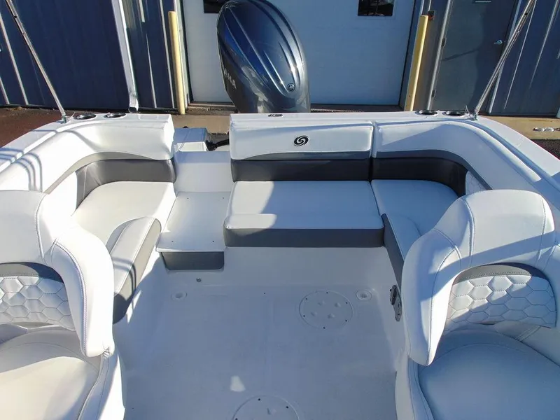 Slide: The Image of 2024 Hurricane SunDeck 191 OB boat interior with white and gray seating. - 8