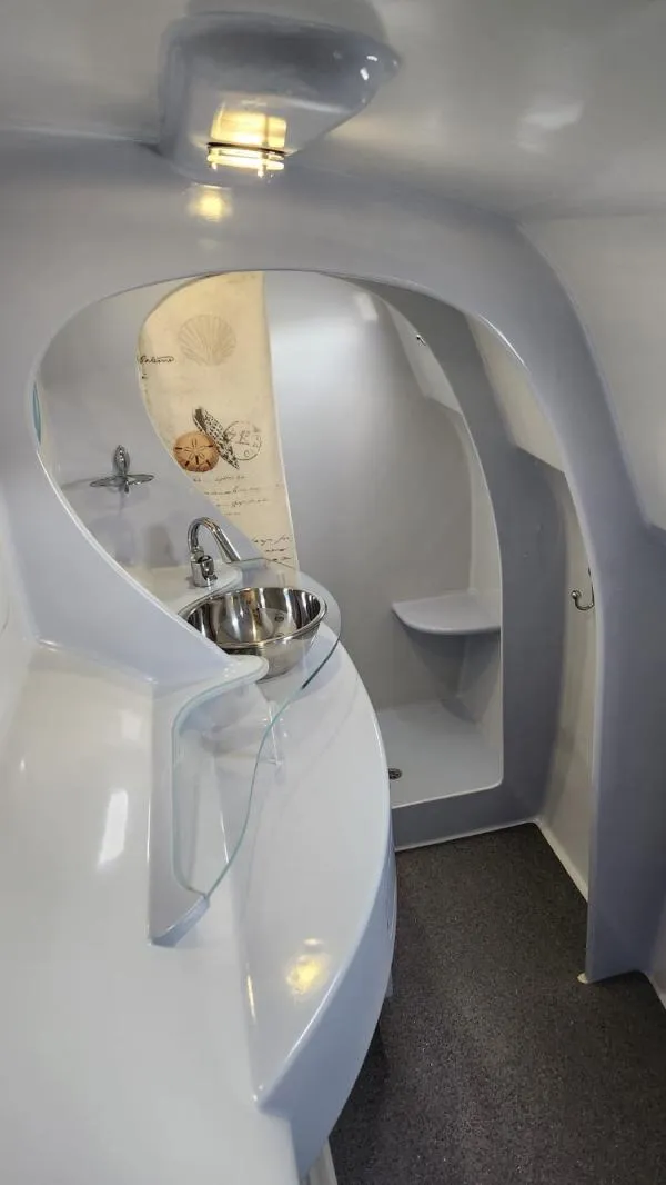 Slide: The Image of Futuristic 1991 Custom Morelli-Miller interior with sleek design and modern fixtures. - 17