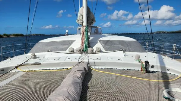 Slide: The Image of Sailing catamaran on water, Custom Morelli-Miller 1991, clear sky, calm sea. - 31