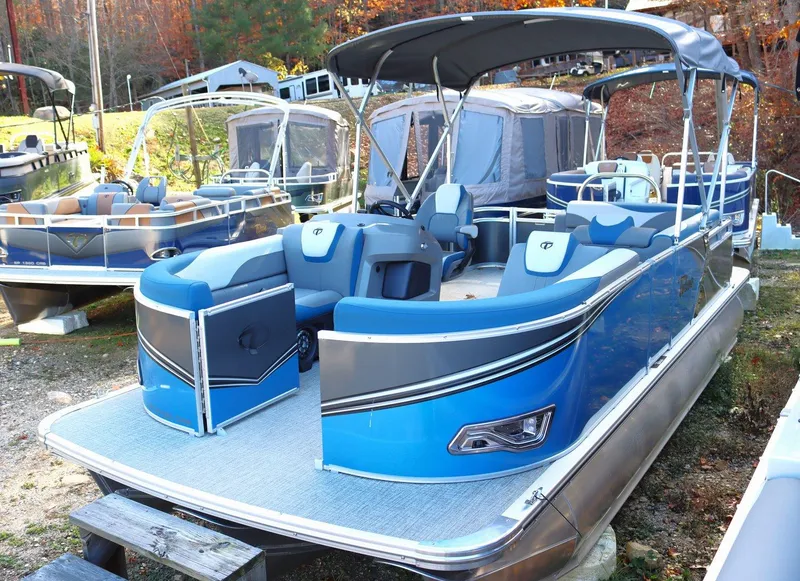 The Image of 2023 Tahoe Pontoon LT - 21' boat in blue, docked with canopy. - 0