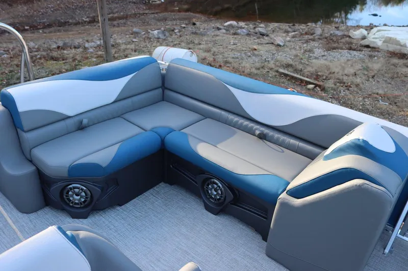Slide: The Image of 2023 Tahoe Pontoon LT-21' interior seating with blue and gray upholstery. - 12