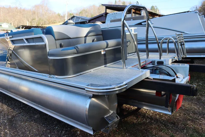 Slide: The Image of 2023 Tahoe Pontoon LT - 21' boat, rear view with seating and ladder. - 17
