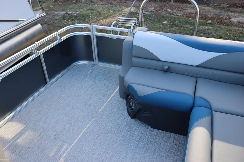 Slide: The Image of 2023 Tahoe Pontoon LT - 21' interior with blue and gray seating. - 18