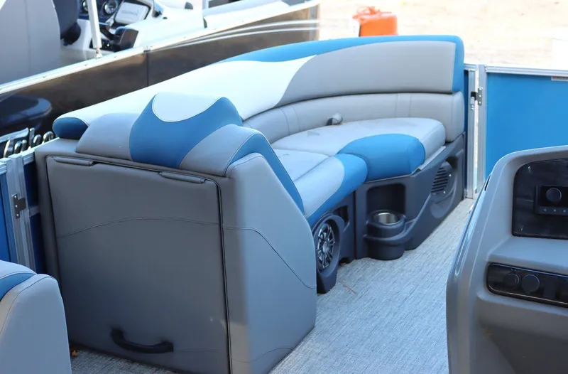 Slide: The Image of 2023 Tahoe Pontoon LT - 21' interior seating with blue and gray upholstery. - 20