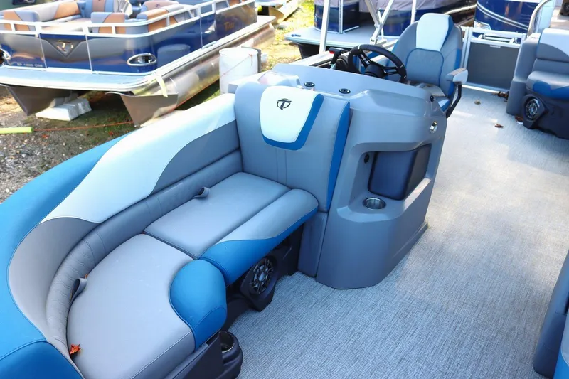 Slide: The Image of 2023 Tahoe Pontoon LT - 21' interior with blue and gray seating. - 3