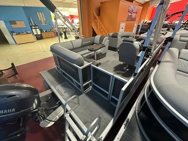 Slide: The Image of 2024 Bennington 188 SVL pontoon boat with Yamaha motor, spacious seating, and modern design. - 4