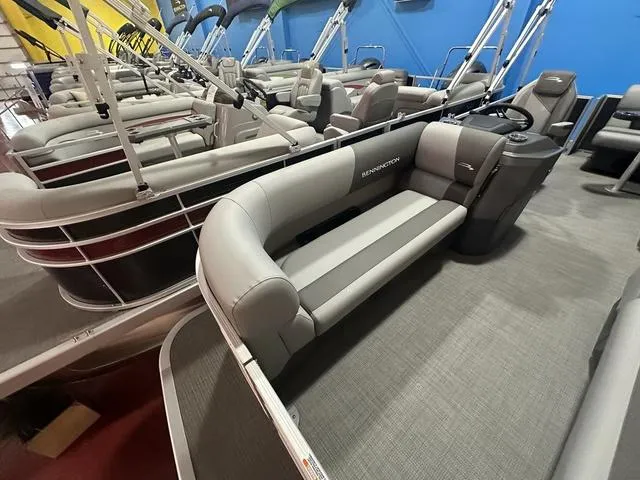 Slide: The Image of 2024 Bennington 188 SVL pontoon boat interior with gray seating and modern design. - 8