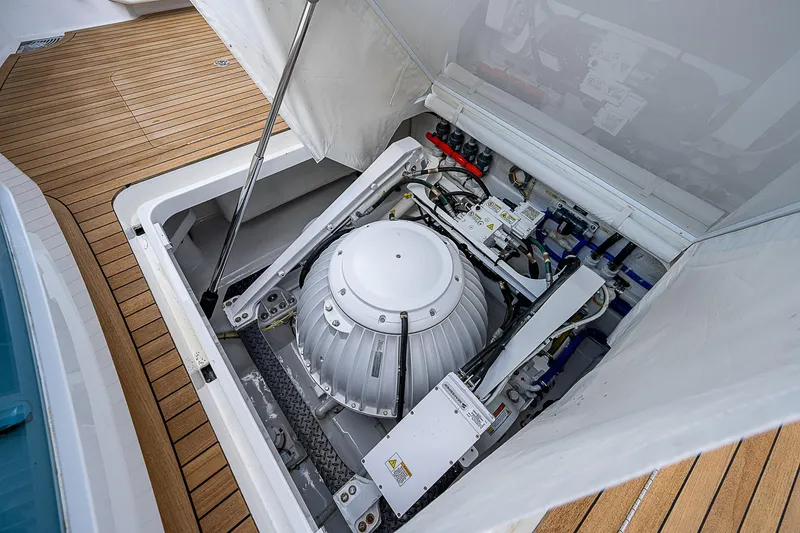 Slide: The Image of Engine compartment of a 2020 Viking 68 Convertible yacht with advanced machinery. - 12