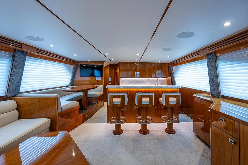 Slide: The Image of Luxurious interior of a 2020 Viking 68 Convertible yacht with modern furnishings. - 37