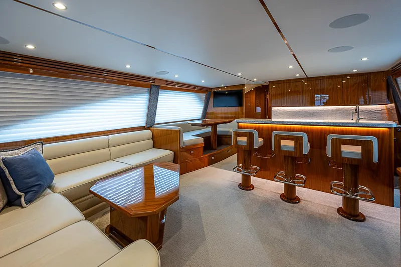 Slide: The Image of Luxurious interior of a 2020 Viking 68 Convertible yacht with modern furnishings. - 38