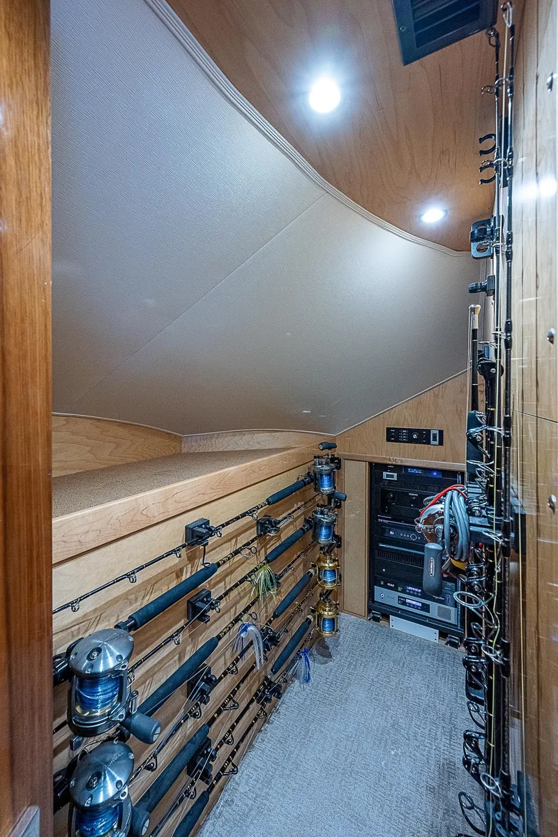 Slide: The Image of Fishing rod storage room in a 2020 Viking 68 Convertible yacht. - 41