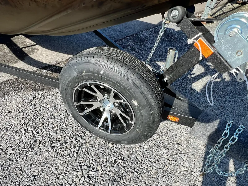 Slide: The Image of Close-up of 2024 G3 Sportsman 1710 VYL boat trailer wheel and tire. - 11